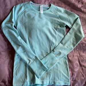 Ivivva Fly Tech Long Sleeve in aqua blue.